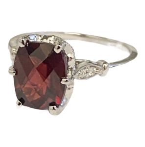 Cushion cut garnet diamond ring