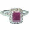 emerald cut ruby halo diamond ring