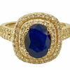 oval sapphire double halo diamond ring in 14 k yellow gold