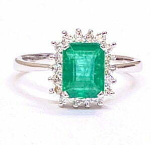 Emerald cut Emerald halo diamond ring