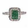 Emerald cut emerald diamond ring