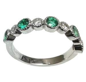 emerald and diamond multiprong ring