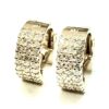 pave set diamond Huggies in 14k yellow gold