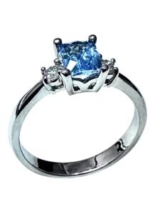 Blue topaz diamond ring