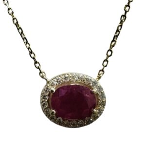 oval ruby and diamond pendant